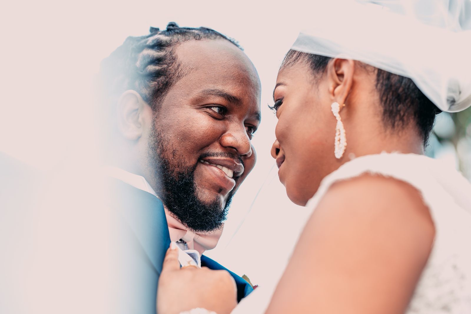 Newlywed couple sharing a tender moment in a romantic portrait